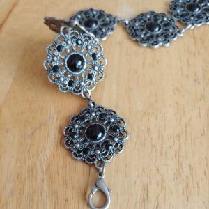 Women's metal waist belt.